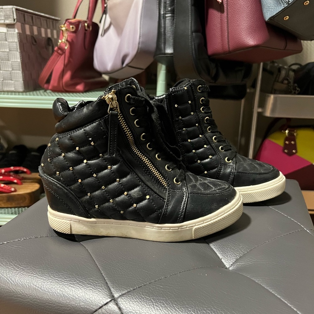 2 for $14 All $8 shoes 
Stylish black sneakers with gold accents